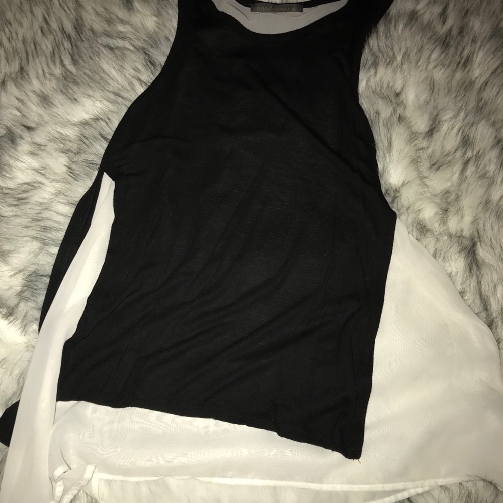Black tank with white flowing fabric